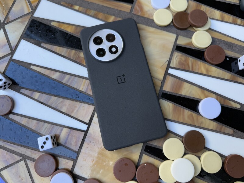 OnePlus 13R on Backgammon board